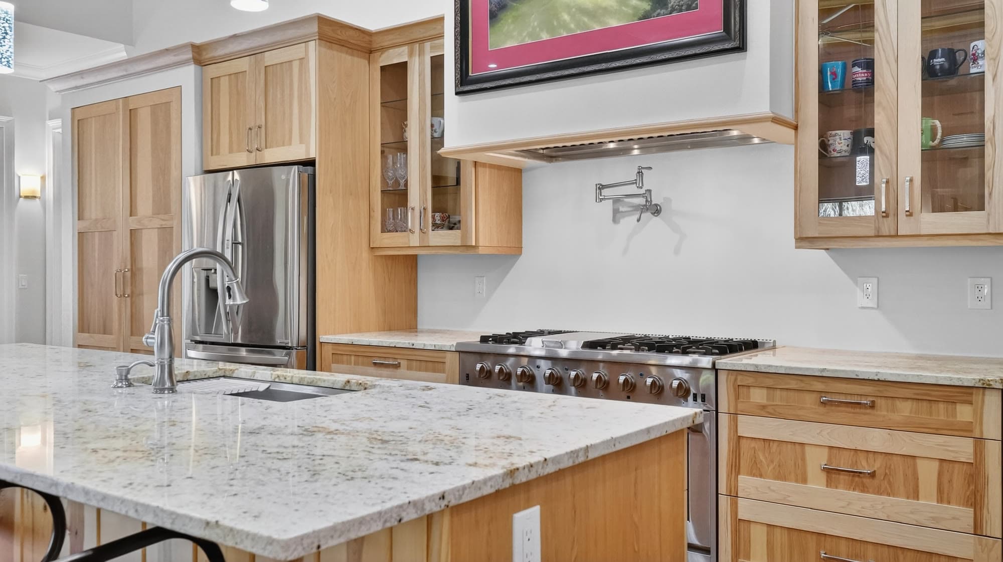 Open-concept kitchen with island and pendant lighting