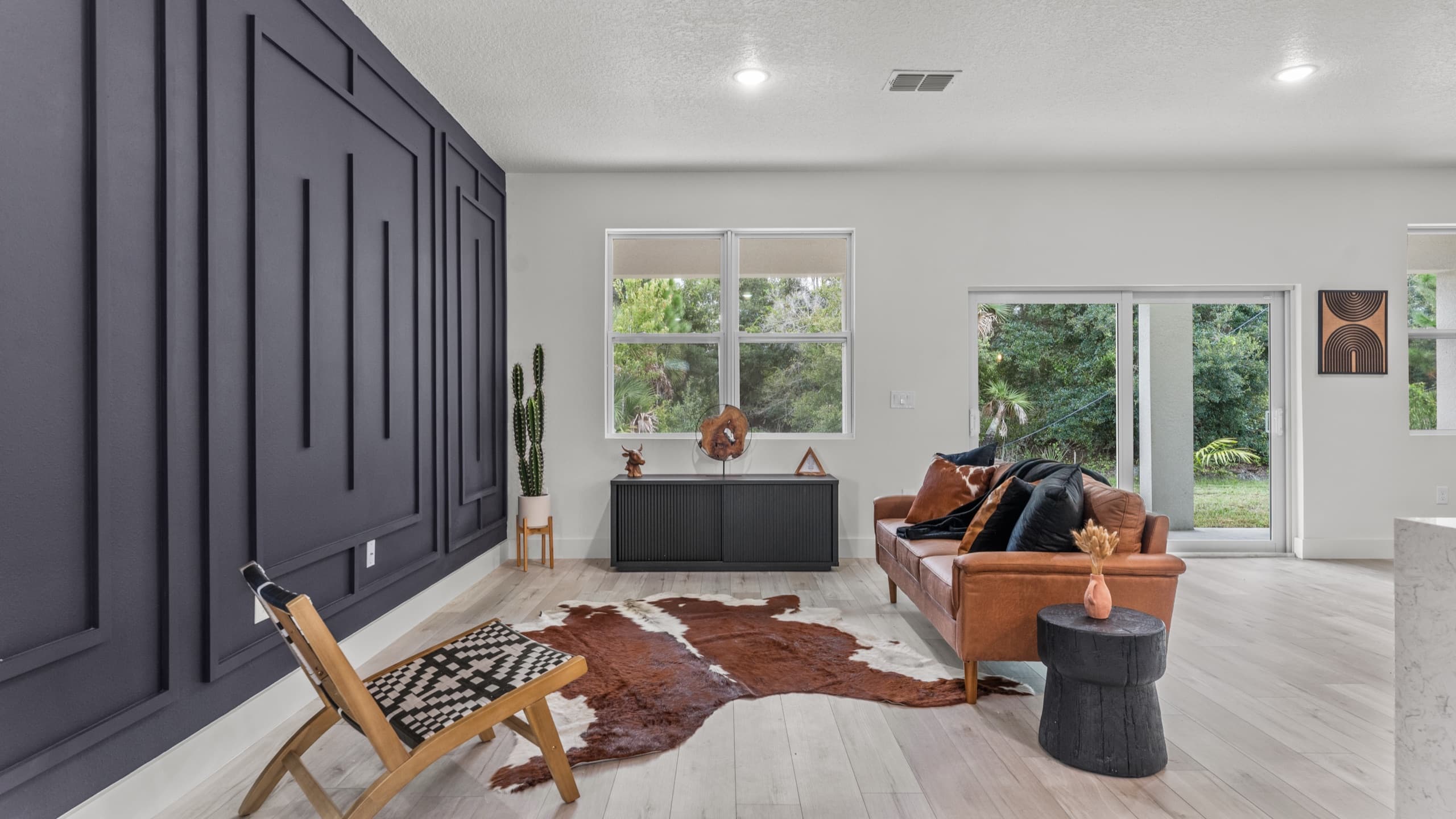 Bright living area styled for showings